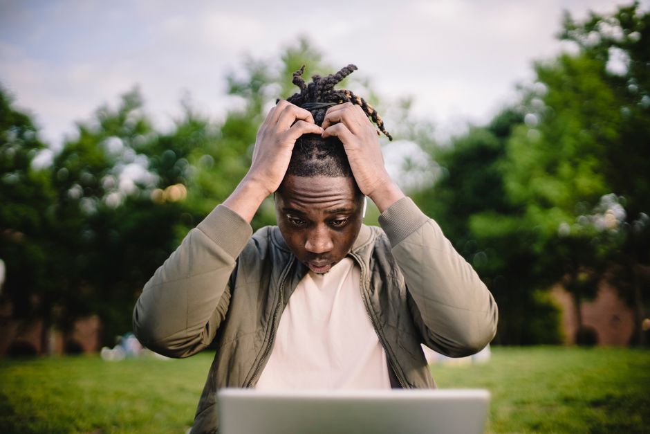Frustrated user looking at a computer screen