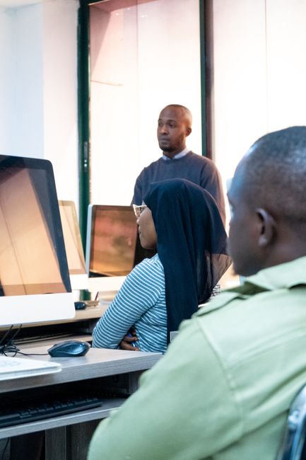 Students in a computer science classroom learning programming