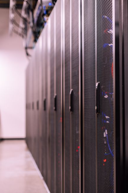 Server racks representing high computing costs for AI video