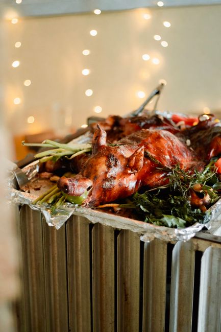 Traditional roasted suckling pig with crispy golden skin
